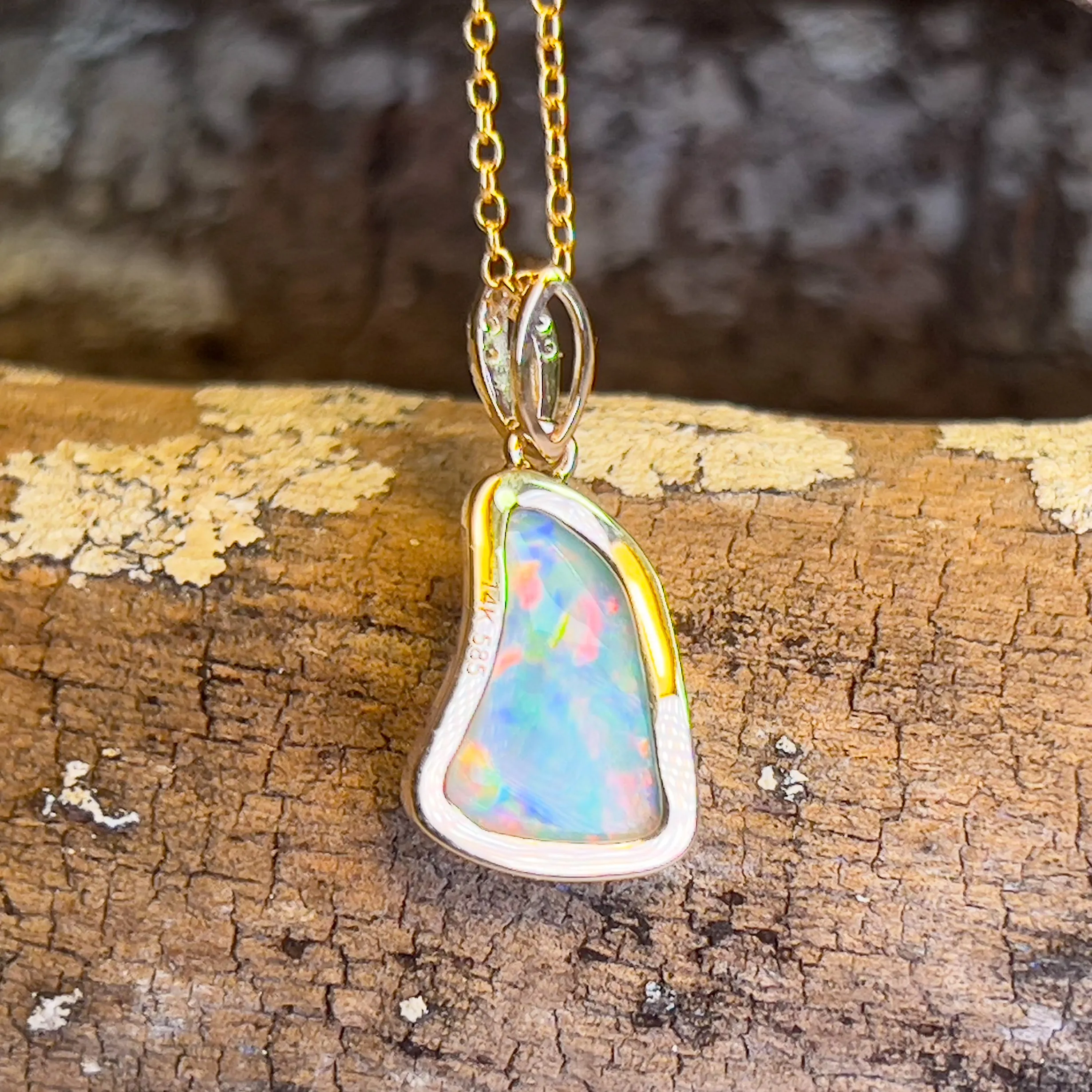 14kt Yellow Gold freeform Crystal Opal 1.5ct and diamond pendant