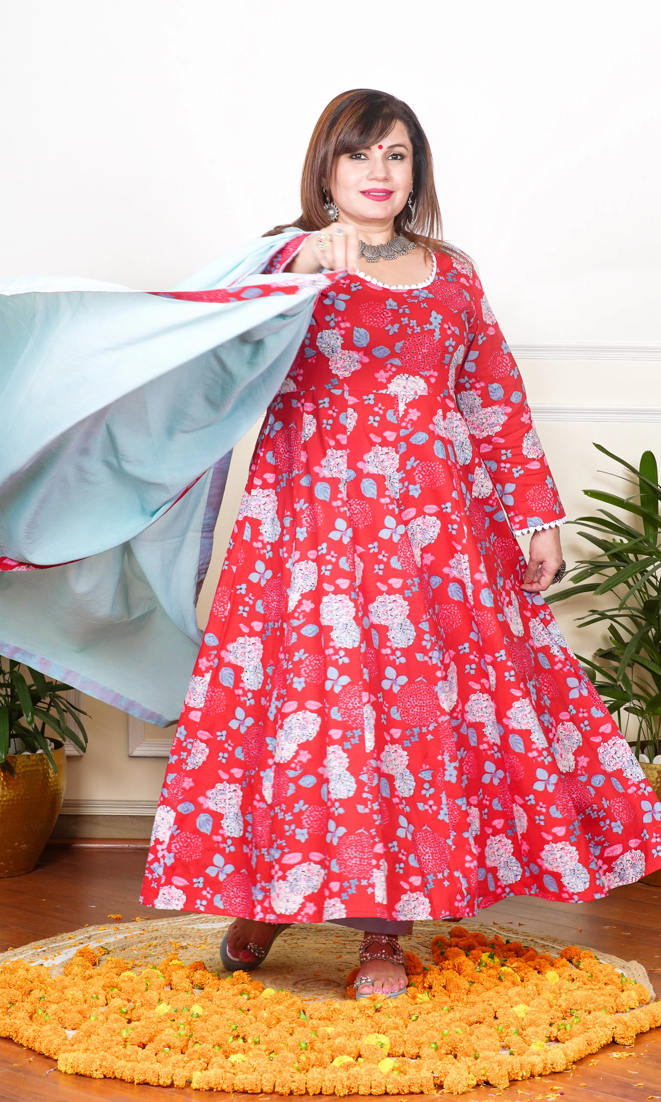 RED AND TURQUOISE FLORAL PRINTED WITH LACE DETAILING KALIDAAR KURTA, WITH PANT AND DUPATTA.