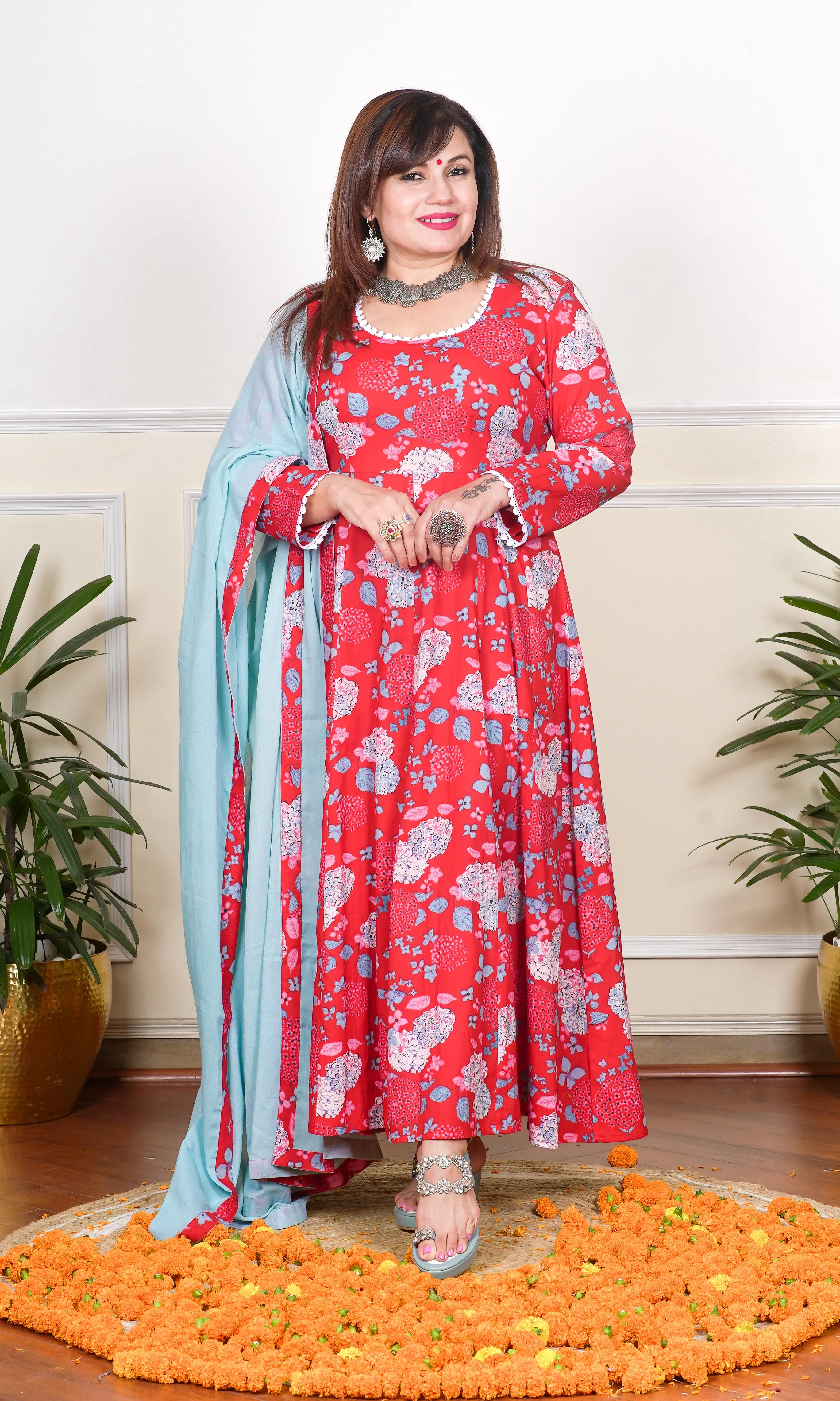 RED AND TURQUOISE FLORAL PRINTED WITH LACE DETAILING KALIDAAR KURTA, WITH PANT AND DUPATTA.