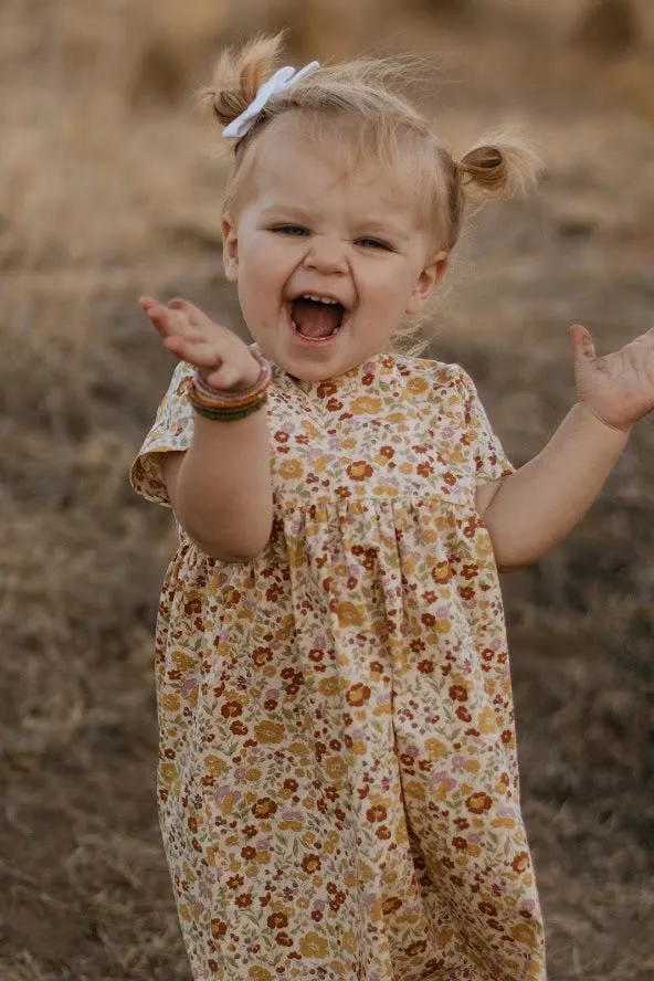 The Dolly Dress in Mustard Floral